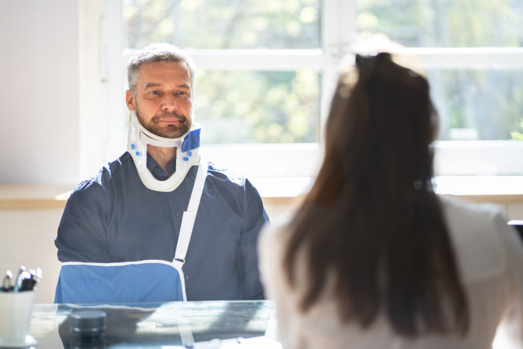 personal injury lawyer talking with their injured client