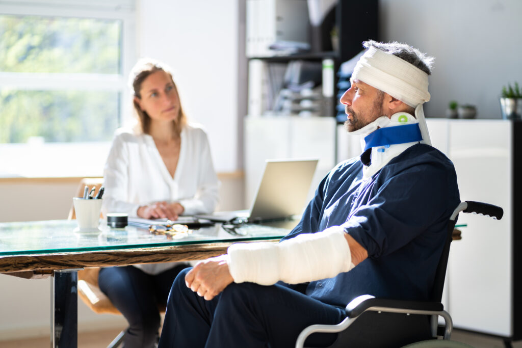 lawyer talking to her injured client