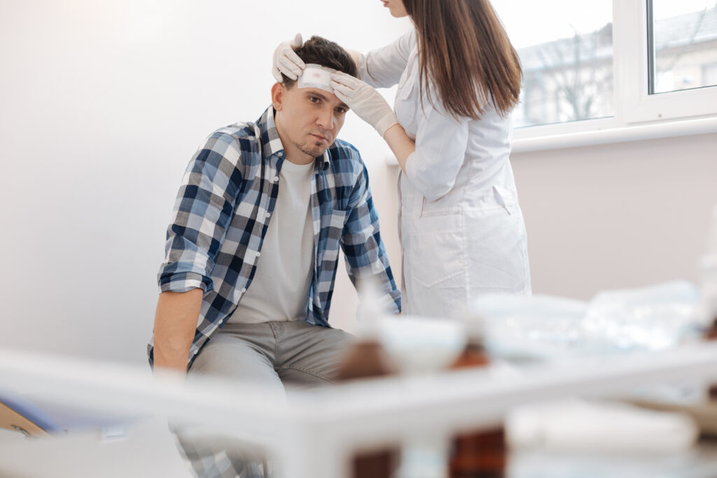 a man with a head injury due to a car accident